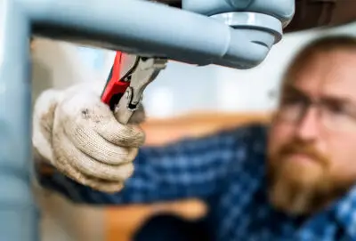 John Fixing a pipe
